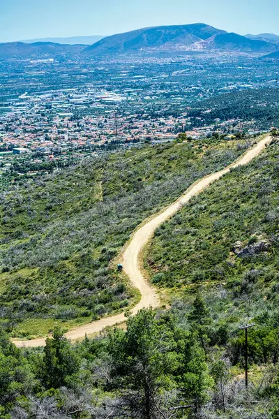 stock image Hymettus mountain country road at Athens, Attica, Greece.