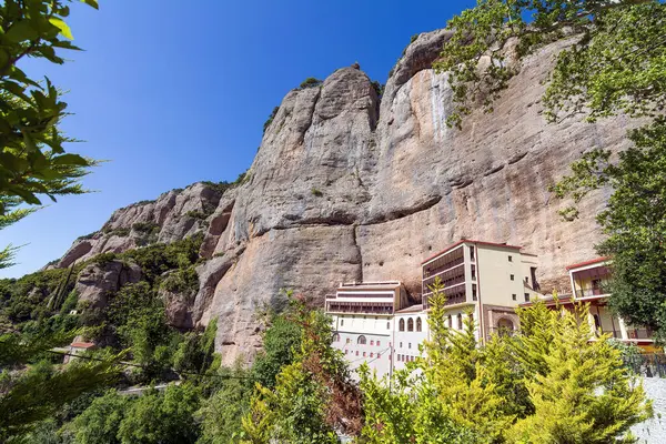 stock image View of the Monastery Of Mega Spilaio in Kalavryta, Greece. The monastery is located in a large cave on a sheer cliff. Formerly known as the Monastery of the Dormition of the Theotokos.