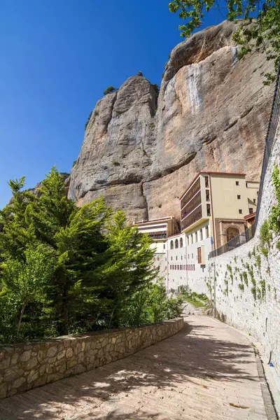 stock image View of the Monastery Of Mega Spilaio in Kalavryta, Greece. The monastery is located in a large cave on a sheer cliff. Formerly known as the Monastery of the Dormition of the Theotokos.