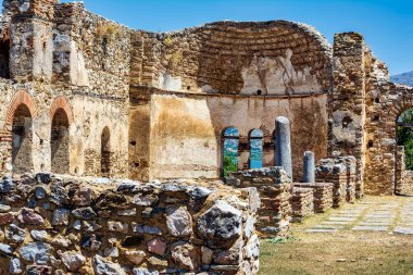 The Basilica of Agios Achilleios, a ruined 10th-11th century Christian church, located on Agios Achilleios Island in Lake Mikri Prespa, Greece. clipart