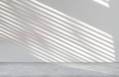 Ürün sunumu için ışık ve gölge bulunan boş odada gri beton duvar dokusu.