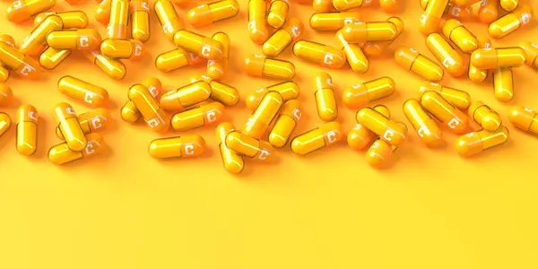 Vitamin C capsules isolated on orange background. Creative image of vitamin C capsules. 3D illustration