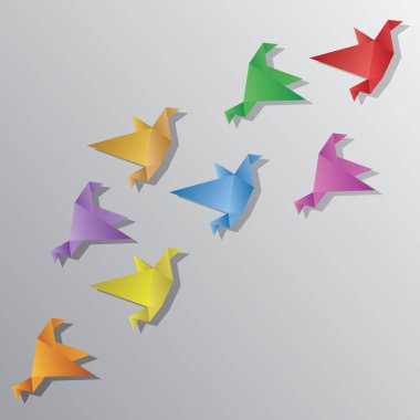 Bir sürü Origami kuşu birlikte uçuyor.