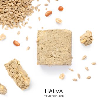 Creative layout made of sunflower halva and peanuts on white background.Flat lay. Food concept. clipart