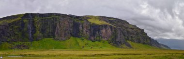 Icelandic South Coast landscape near Reynisfjara black volcanic sand beach near Vic at south coast of Iceland, Scandinavia, Europe clipart