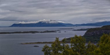 Coastline Fjord views from Alesund, Norway from hiking trail above the city, travel scenery Scandinavia Europe clipart