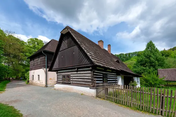 stock image Grandma's Valley - Old Bleach is a romantic wooden cottage with a traditional shingle roof. It was built in 1797 by miller Antonin Ludr.