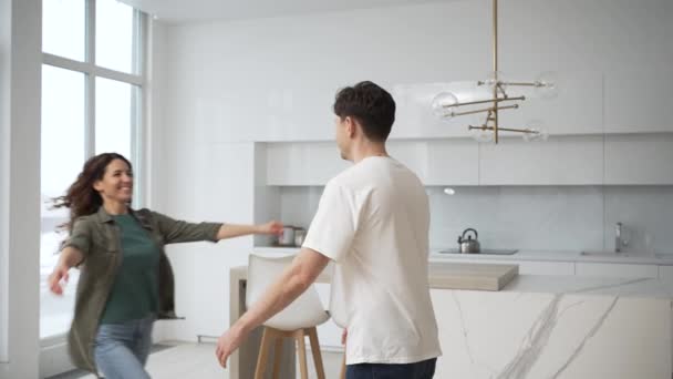 Young Brunet Man Catches Holding Arms Spins Curly Wife Shirt — Stock Video