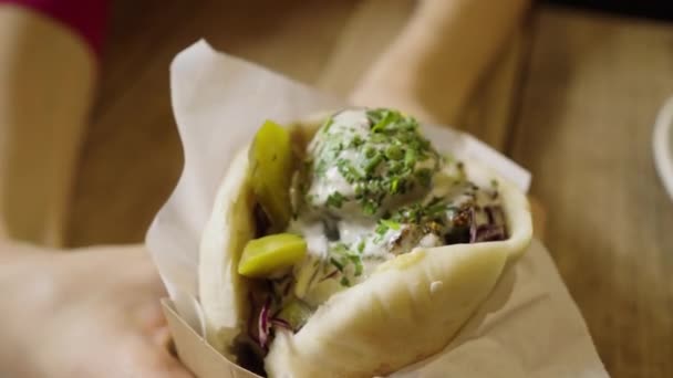 Female Hands Slowly Turn Delicious Falafel Pita Sauce Cucumbers Sprinkled — Stock video