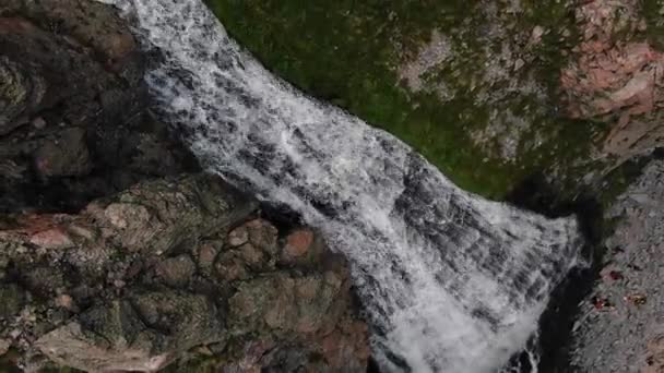 Birds Eye View Cascading Waterfall Amidst Rugged Mountain Terrain Group — Stock Video