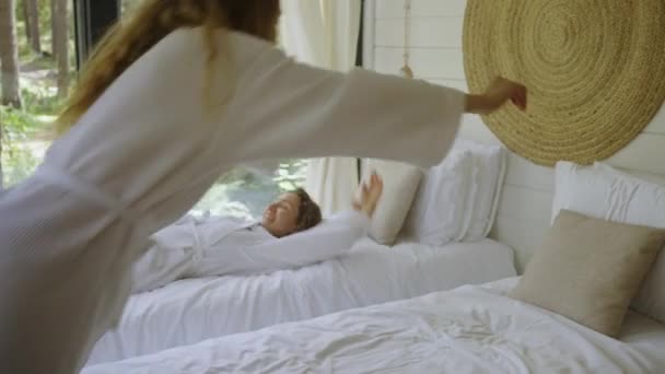 Female Girlfriends White Coats Jump Soft Beds Forest House Glamping — Stock Video