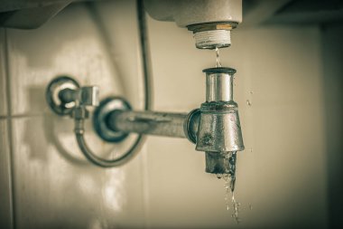 Repairing clogged and leaky washbasin sewer in the bathroom