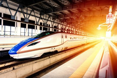 high speed train, bullet train in railway station.