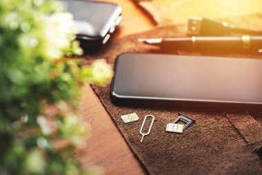 SIM card for smart phone. Changing the SIM card.