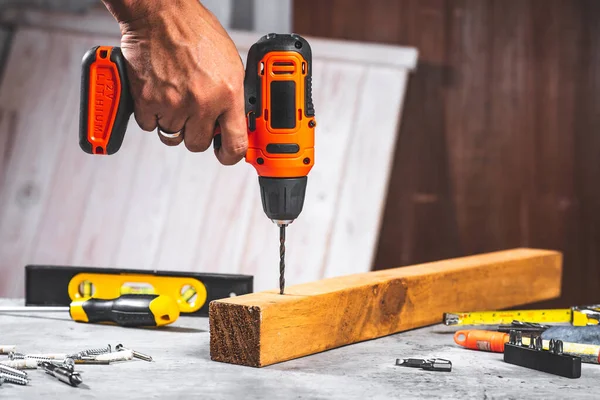 Man Working Black Orange Cordless Screwdriver Power Tool Construction Diy — Stock Photo, Image