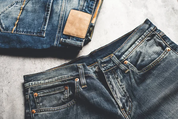 Viele Blue Jeans Auf Betongrund Herren Mode Jeans — Stockfoto