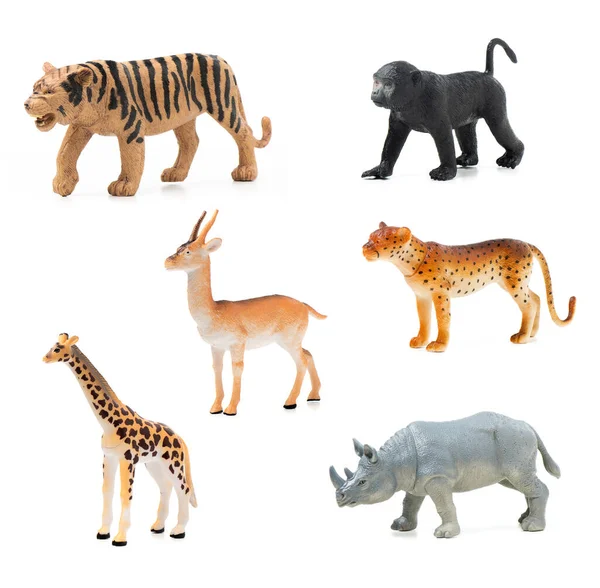 一组丛林动物玩具在白色背景上被隔离 塑料动物玩具 图库图片