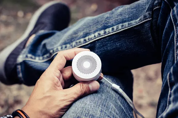 mini wireless portable bluetooth speaker for music listening. Voice assistant speaker at home.