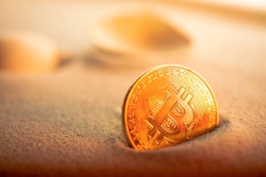 Kumsaldaki altın kripto para birimini kapat..