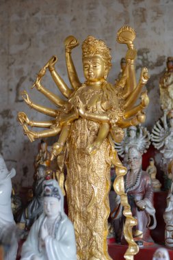 Guan Yin statue at Chao Mae Guanyin Shrine located in Angsila, Chonburi, Thailand. clipart