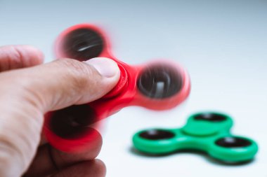 Plastik hareketli döner oyuncak, stres ve endişe giderici oyuncak.