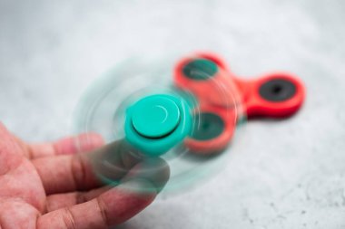 Plastik hareketli döner oyuncak, stres ve endişe giderici oyuncak.