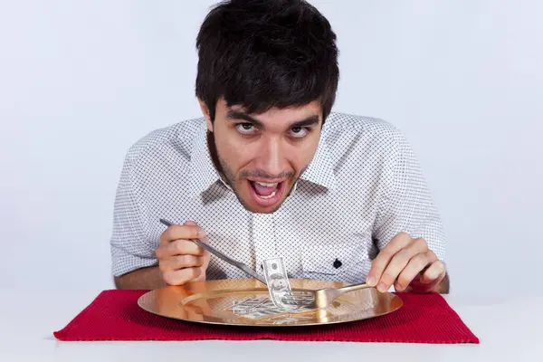 Man Eating Money Plate Fork Knife Royalty Free Stock Images