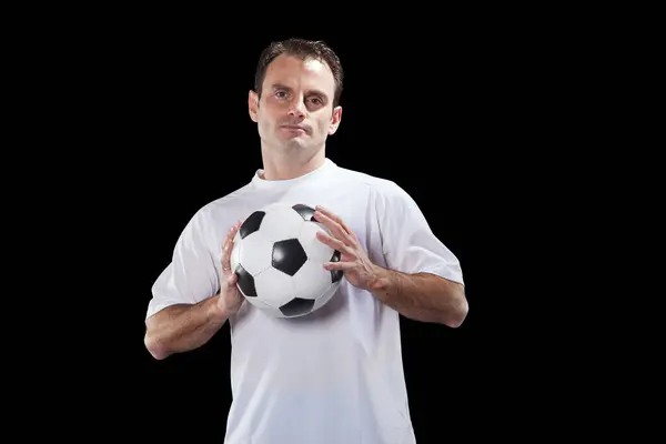 Ποδοσφαιριστής Κρατώντας Μια Μπάλα Εικόνα Αρχείου