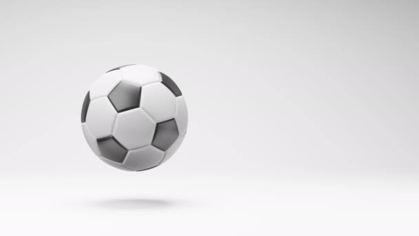 具有复制空间的无缝隙循环3D动画在工作室浅灰背景下的足球旋转 — 图库视频影像