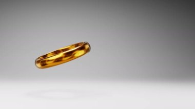 Stüdyo Gri Arkaplanda Altın Halka Dönüşü, Kopya Boşluğu ile Kusursuz Üç Boyutlu Döngü Canlandırması