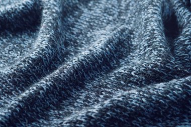 Doku örülmüş arka plan. Örgü yün kumaş kıvrımları..