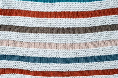 Örgü arka plan. Çizgili pamuk kumaşın dokusu yakın..