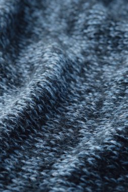 Doku örülmüş arka plan. Örgü yün kumaş kıvrımları..
