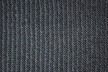 Siyah çizgili örgü kumaş. Koyu örülmüş doku arkaplanı.