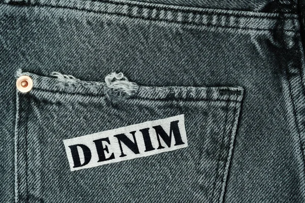 Schienale Jeans Nero Tasca Con Scritta Denim Ricamata — Foto Stock