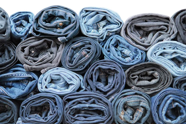 Lots Rolled Jeans Denim Background Trendy Denim Clothing Shopping Fashion — Stock Photo, Image