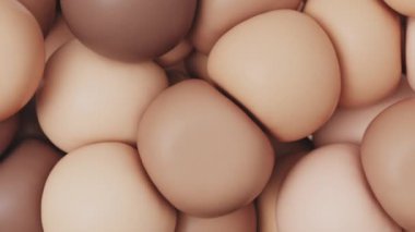 Yumuşak, mat, cilt tonu küreler yakın çekim birbirine sıkıca sarılmış, bej, şeftali ve kahverengi gölgeler.