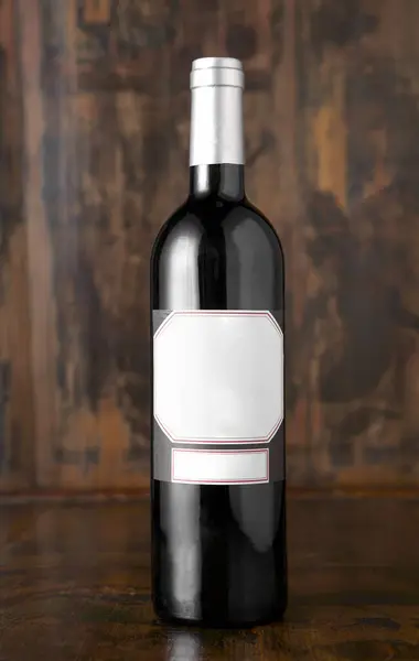Weinflasche Auf Holzgrund — Stockfoto