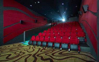 Koltukları, koltukları ve sineması olan sinema salonu.