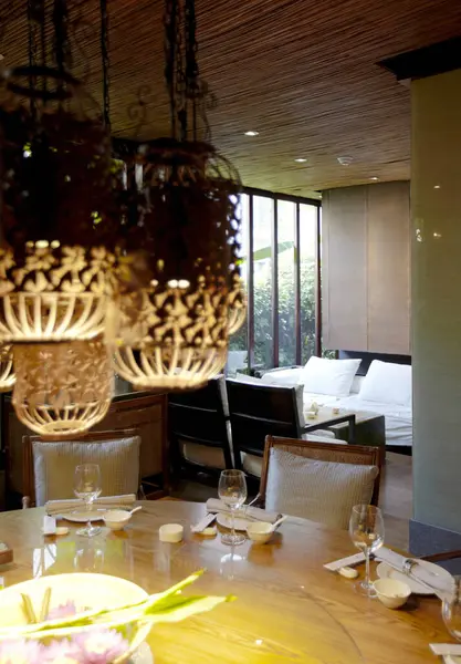 interior of a restaurant with a table and a window