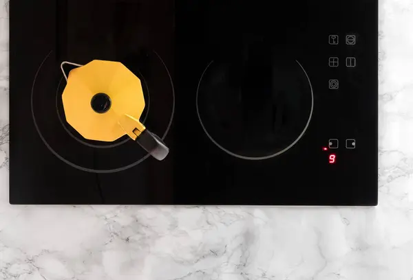 stock image Coffee pot situated on the stove. Top view