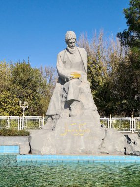 Ashgabat, Turkmenistan - March 11, 2023: Monument to the famous poet and philosopher of the ancient East Magtum Kuli. clipart