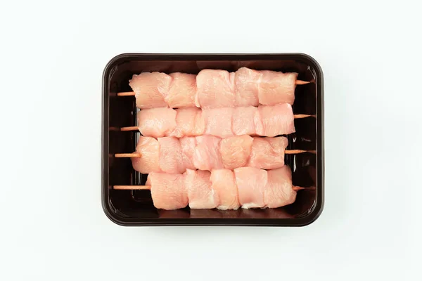 stock image Chicken breast Fillets. Fresh, raw chicken in the package. Closeup of chicken meat. Chicken Skewers breast fillet meat.Procurement for designers.