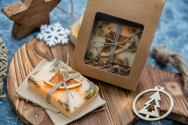 Hand made natural soap with decoration as a gift for Christmas