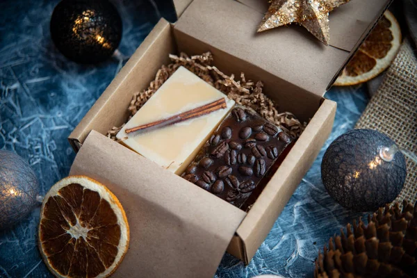 Hand made natural soap in festive box as a gift for Christmas