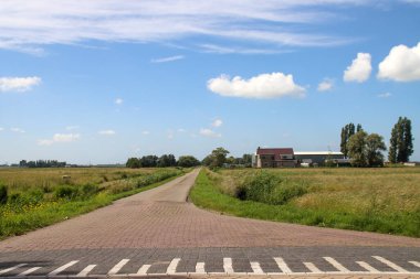 Meadows and roads in the Zuidplaspolder area where new village will be build in the Netherlands