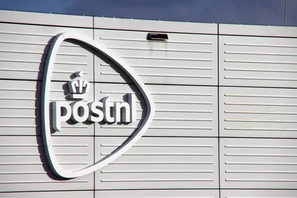 stock image PostNL logo on the distribution and sorting center in The Hague Forepark in the Netherlands