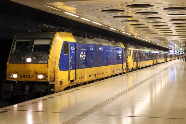 stock image Traxx locomotive with ISR passengers wagons at Schiphol Amsterdam Airport in the Netherlands