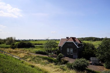former pumping station of the Blaardorpse Esse and Gansdorp polder (reclaimed land) in Nieuwerkerk aan den IJssel the Netherlands clipart