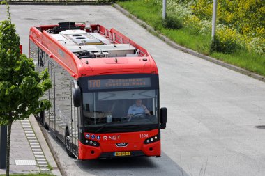 RET's red and black R-net regional buses at Zoetermeer Lansingerland station the netherlands clipart
